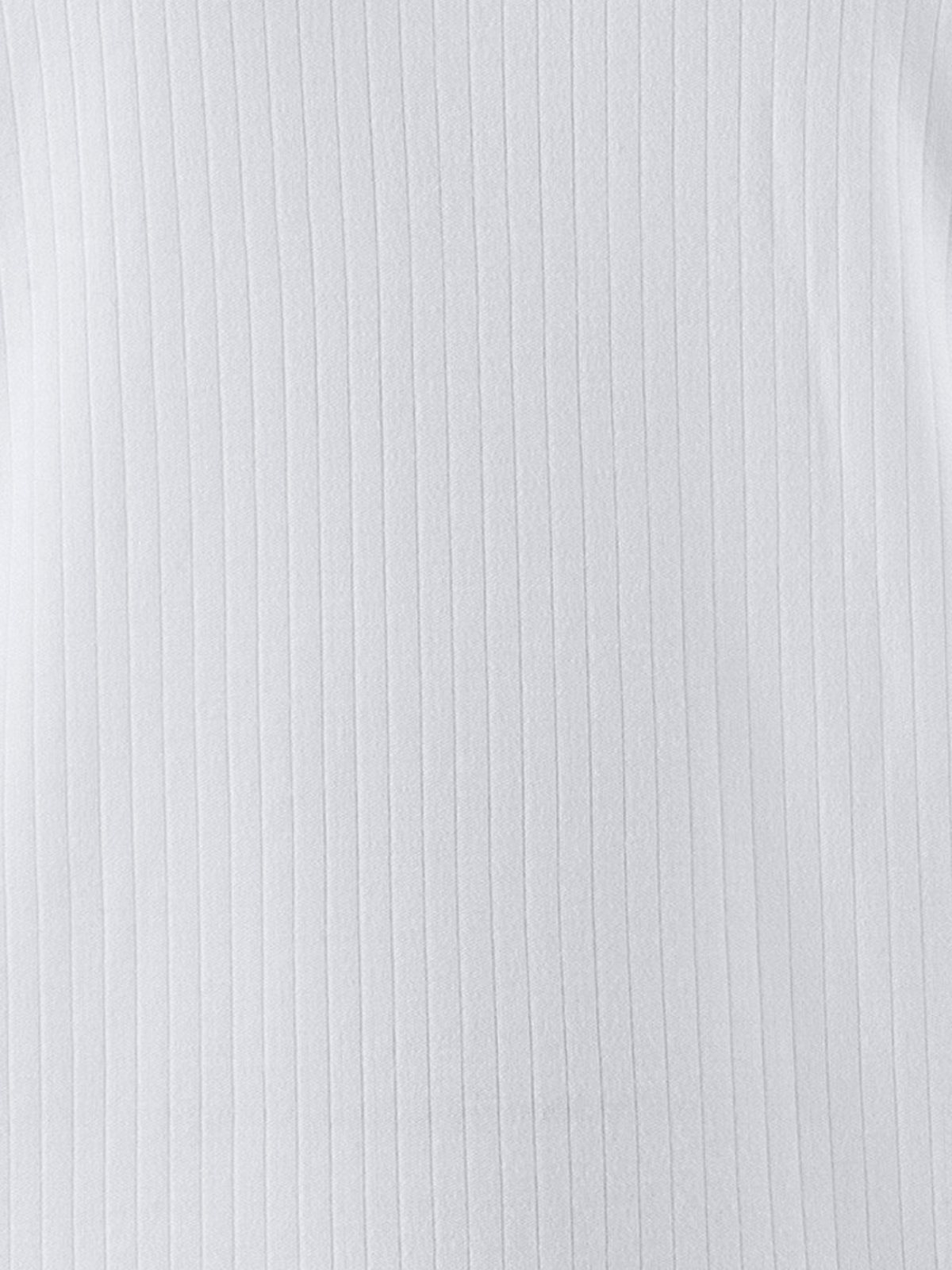 Camiseta de manga larga blanca — detalle del tejido