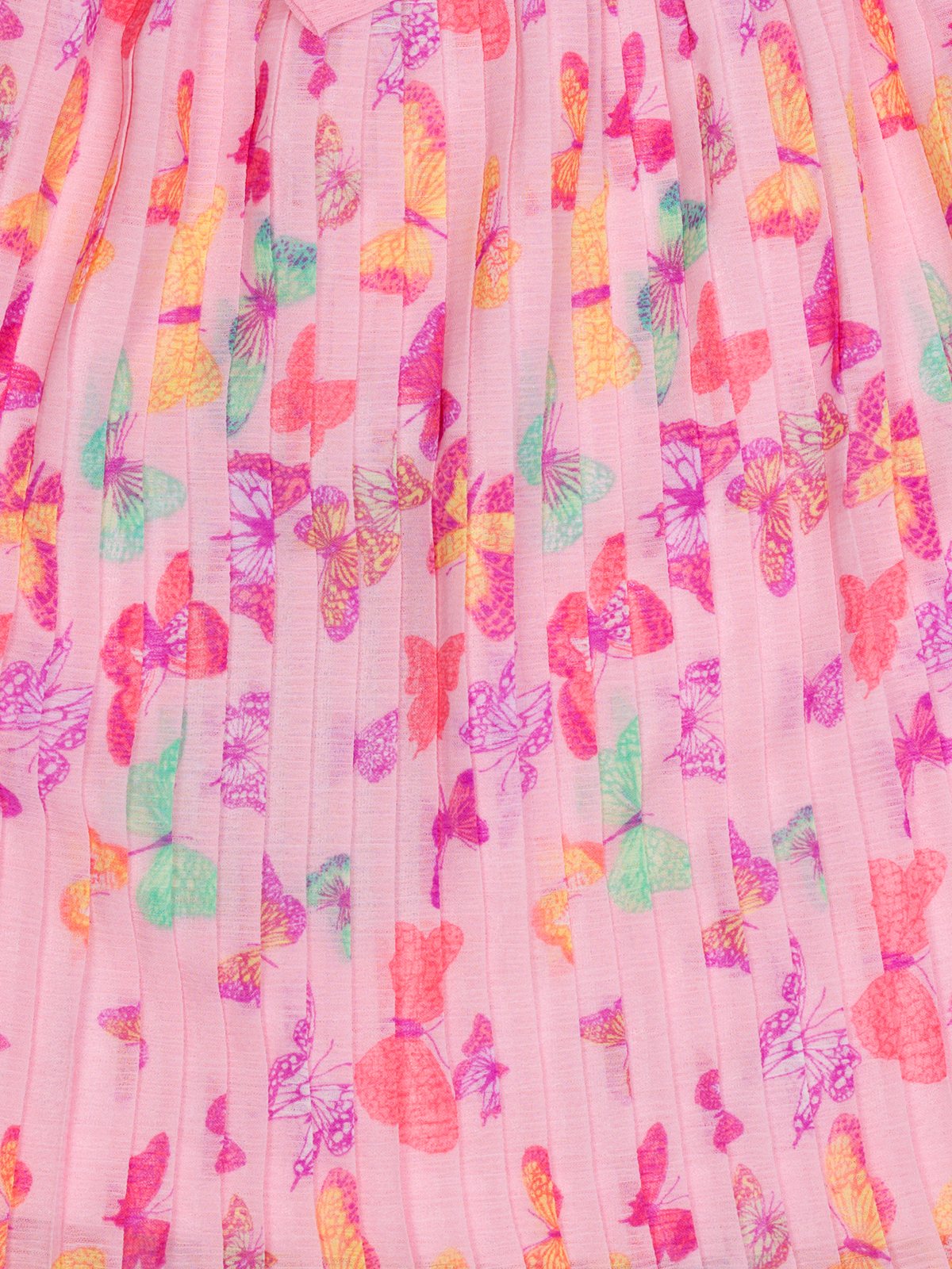 Falda plisada estampada — detalle del tejido